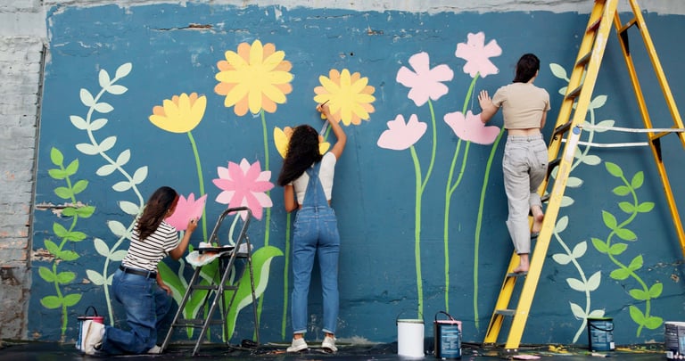 Wall art, women and painting mural outdoor for sustainable awareness, community project or creative teamwork